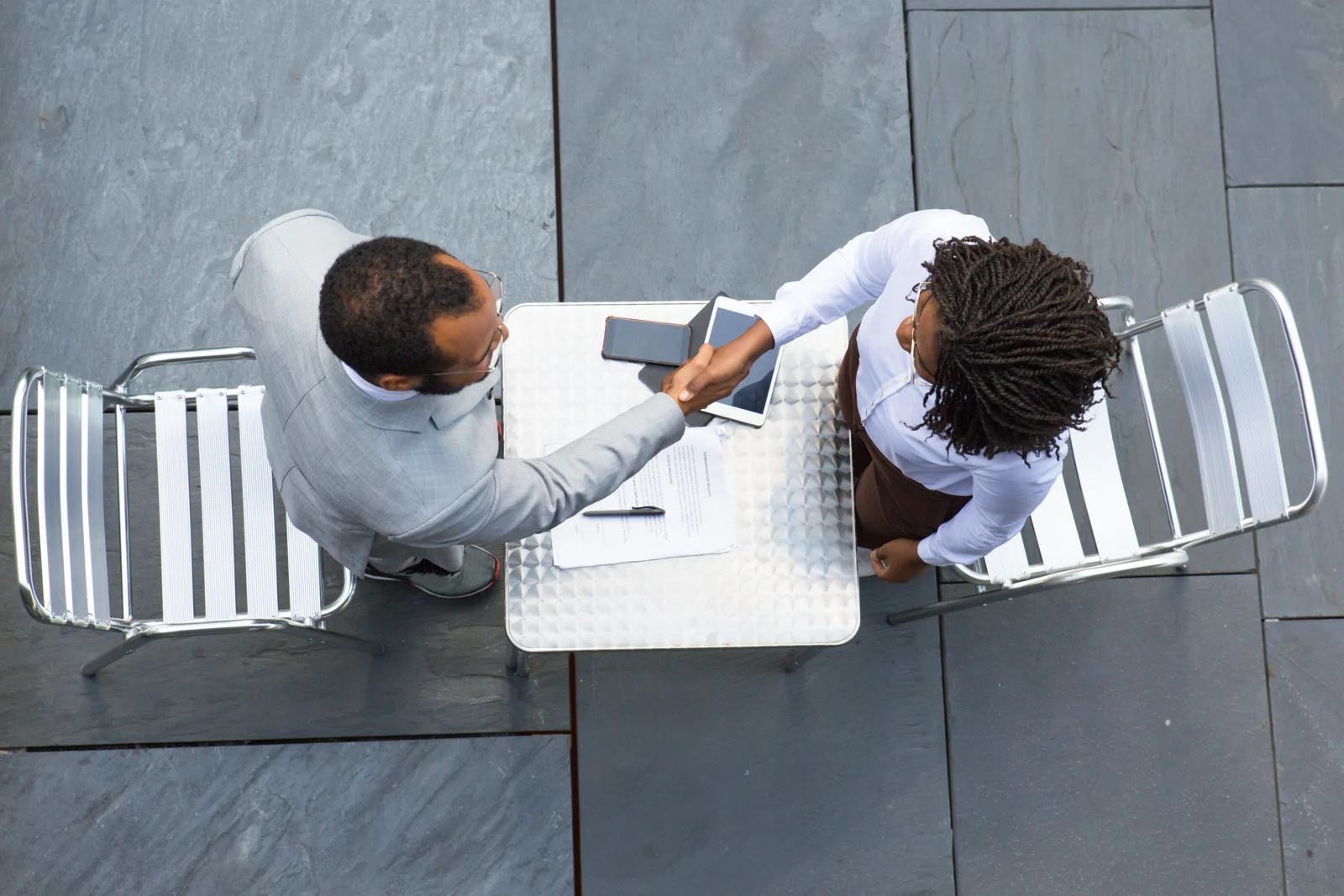 Business partners reviewing documents together